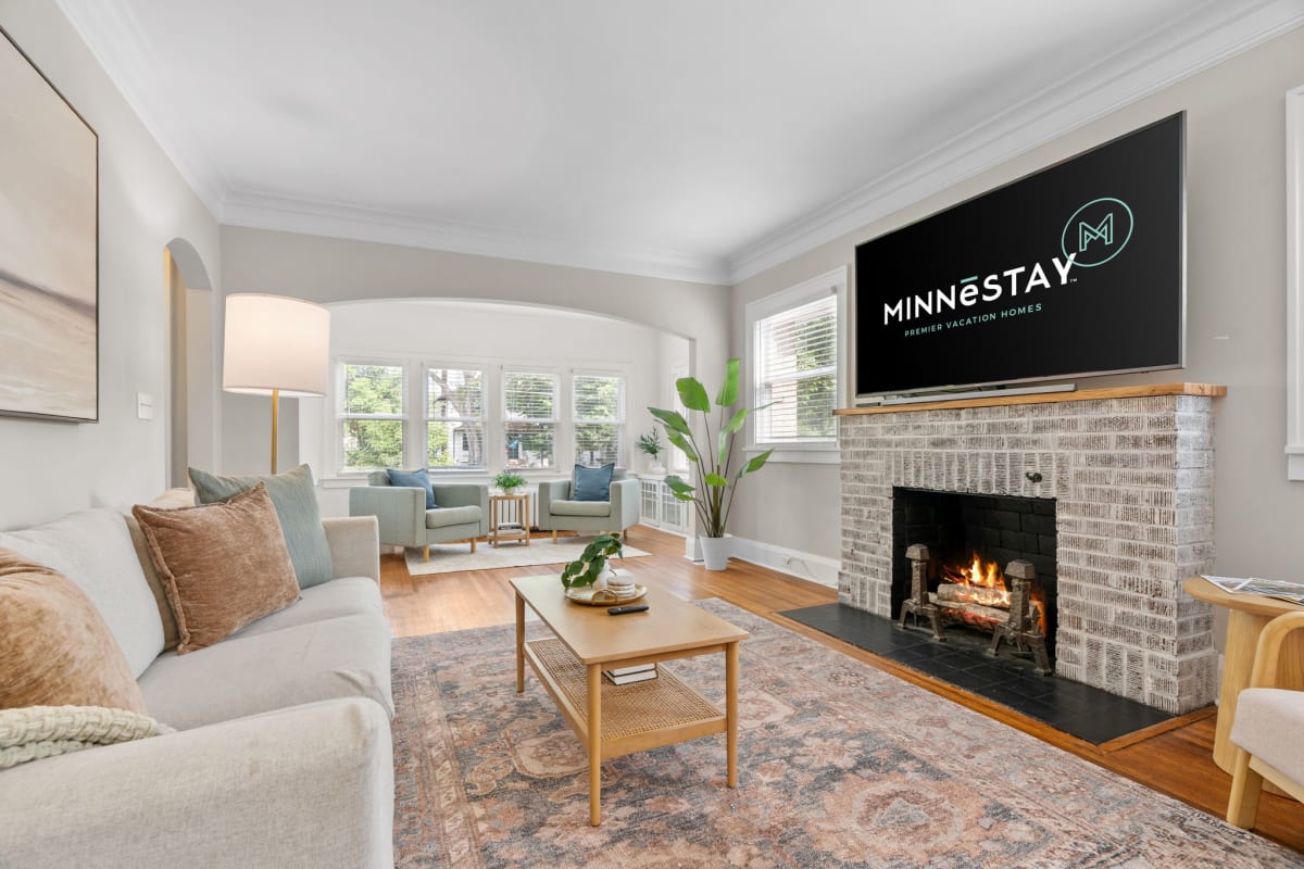 Sink into plush sofas by your crackling fireplace while streaming favorites on the wall-mounted TV.