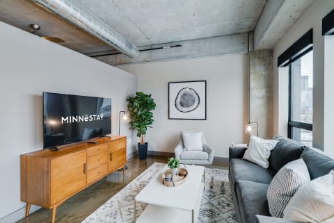 Stylish living room with modern furniture and decor elements.