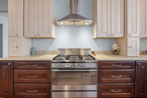 Your gourmet kitchen awaits with gleaming stainless steel appliances and elegant cabinetry, perfect for creating memorable meals together.