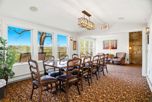Gather around the dining table and enjoy the views. Perfect for memorable meals together.